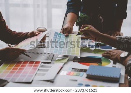 Web creative team Graphic designer planning for mobile phone choose color template draw app website ux ui for mobile application and development model Prototype outline development process.