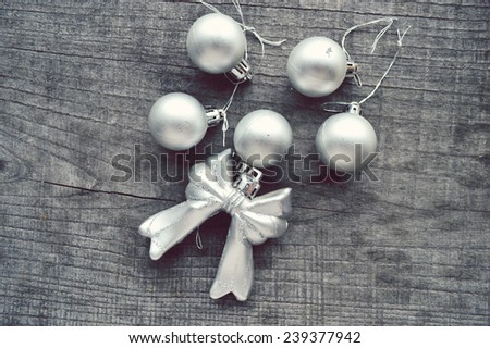 Christmas toys, balls on a wooden background