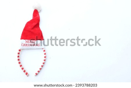 Beautiful headband 
 Decorative red Santa Hat isolate on a white backdrop.
concept of joyful Christmas party,New year is coming soon, festive season decoration with Christmas elements