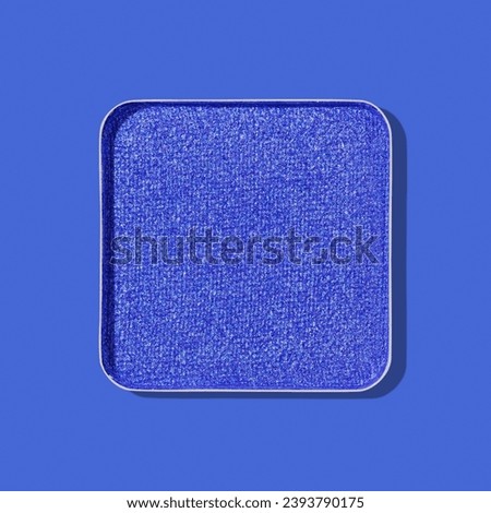 Top view eye shadow glitter blue swatch with shadow, monochrome minimal style photo, sparkling eyeshadow, colored shiny powder for festive makeup, square shape metal pack, beauty cosmetics card