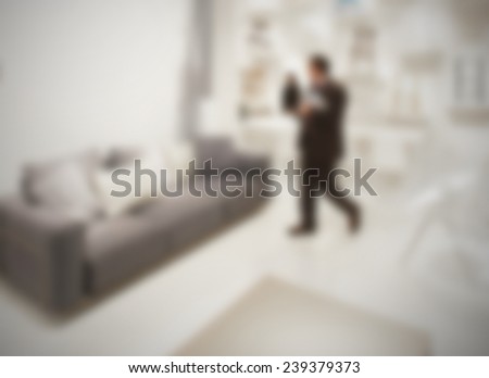 Background with not recognizable people, intentionally blurred post production.