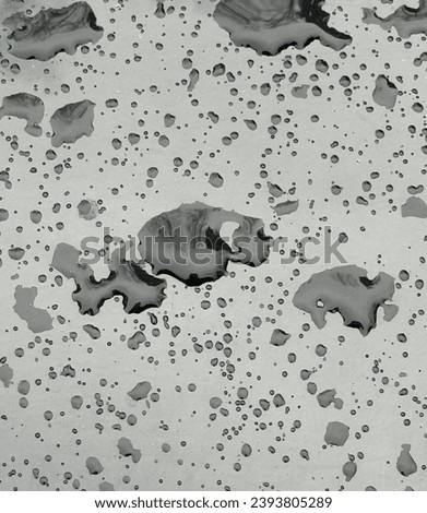 Water drops on a gray background. Texture.