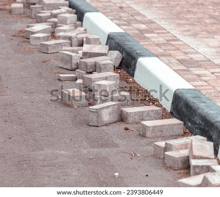 Repair of paving slabs on the road.