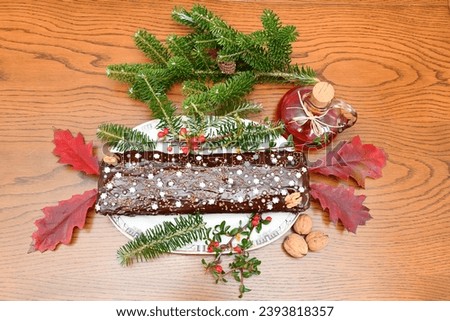 Christmas decoration with gingerbread on an oak table