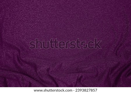 Trendy 80s, 90s, 2000s Background of draped dark purple fabric with silver lurex thread. Beautiful fashionable shiny fabric with a shiny thread for making clothes. Textile background texture. Royalty-Free Stock Photo #2393827857