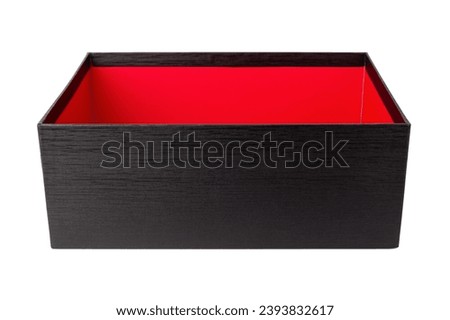 Open cardboard box isolated on white background. Empty black box with red inside.