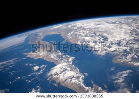 Aerial View of Southern California and the Bay Area with San Diego, Mexico Border, and Cloud-Adorned Sky. Elements of this image furnished by NASA