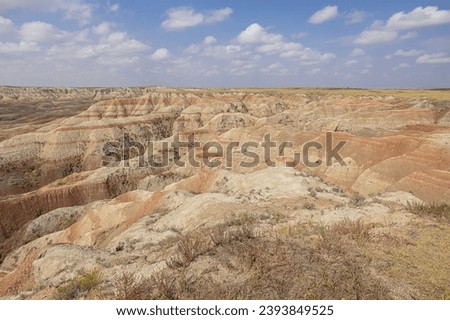 Colorful canyons at Bigfoot Pass Overlook in the Badlands National Park Royalty-Free Stock Photo #2393849525