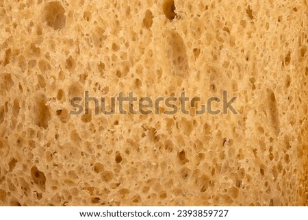 Fresh wheat bread close-up. Inside freshly baked delicious bread
