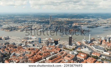 Gothenburg, Sweden. River Gota-Alv. Panoramic view of the central part of the city. Summer day. Cloudy weather, Aerial View   Royalty-Free Stock Photo #2393879693