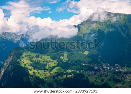 Townscape of village of Wengen on the edge of Lauterbrunnen Valley. Traditional local houses in Wengen village in the Interlaken district in the Bern canton of Switzerland.