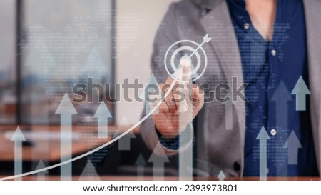 Business Analyst Presenting Upward Trend in Financial Report Royalty-Free Stock Photo #2393973801