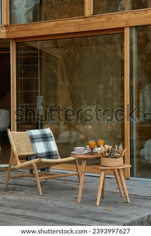 Relaxing outdoor breakfast scene on a wooden porch
