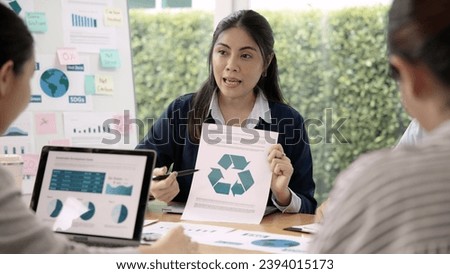 Carbon offset price report CO2 emission. Future growth Net zero waste in ESG ethical SME office protect climate change global warming social issues project. Group of asia people Eco friendly SDGs plan Royalty-Free Stock Photo #2394015173