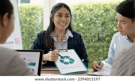 Carbon offset price report CO2 emission. Future growth Net zero waste in ESG ethical SME office protect climate change global warming social issues project. Group of asia people Eco friendly SDGs plan Royalty-Free Stock Photo #2394015197