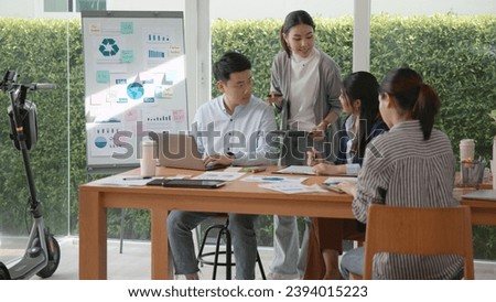 Carbon offset price report CO2 emission. Future growth Net zero waste in ESG ethical SME office protect climate change global warming social issues project. Group of asia people Eco friendly SDGs plan Royalty-Free Stock Photo #2394015223