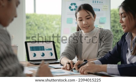 Carbon offset price report CO2 emission. Future growth Net zero waste in ESG ethical SME office protect climate change global warming social issues project. Group of asia people Eco friendly SDGs plan Royalty-Free Stock Photo #2394015225