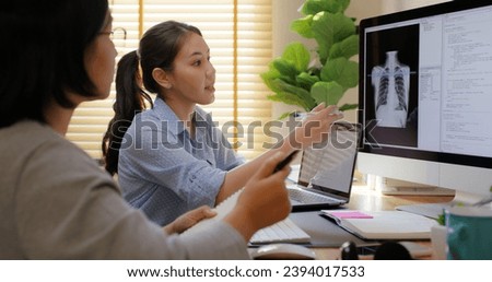 Big data AI coding screen for asian future health care smart tech IT solution. Asia team woman people code analyst job work on science project Lung X-ray scanner medtech tools meeting talk at office. Royalty-Free Stock Photo #2394017533