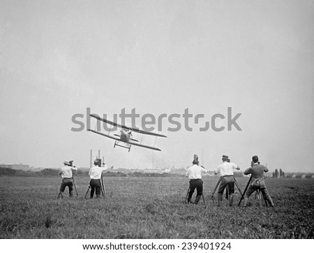 Four motion picture photographers record a naval sea plane buzzing them in 1927 near Washington, D.C.