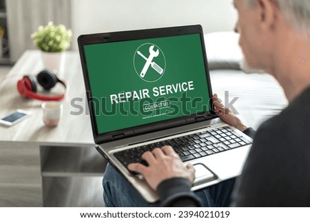 Laptop screen displaying a repair service concept