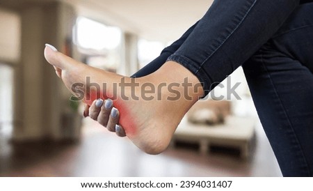 Young girl feels pain under her sole                               