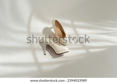Beautiful bridal White high heel shoes of the Bride Royalty-Free Stock Photo #2394033989