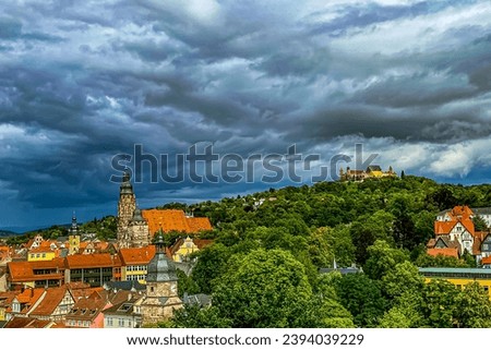 beautiful picture of a small town in Germany. You can see the church and the city's castle on a mountain