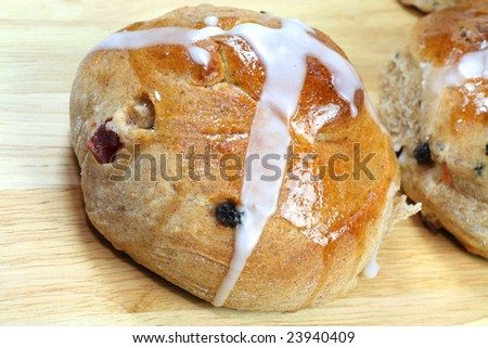 Traditional hot cross buns full of raisins and currents.  Special treat for Easter.