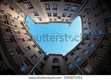 Bottom view of old houses in the historical center of the city - film photo Royalty-Free Stock Photo #2394071551