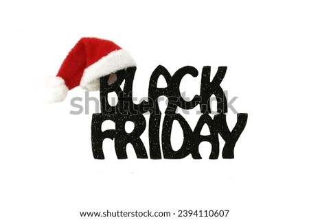 Black Friday inscription in black color with Santa Claus hat