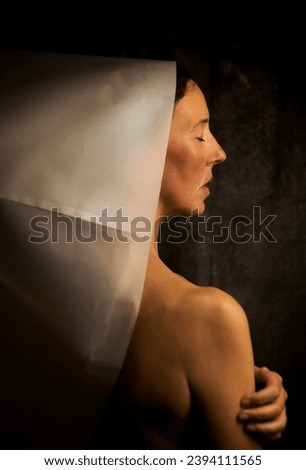 woman in white paper hood II