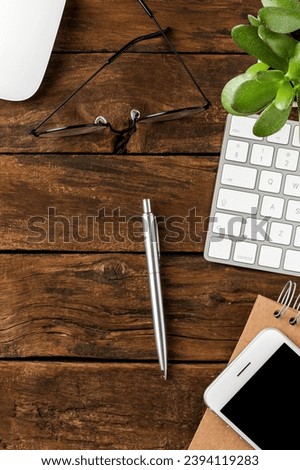 Modern workplace with computer keyboard and business accessories. Office desktop