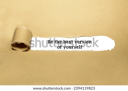 Motivational quote Be The Best Version Of Yourself appearing behind torn brown paper. Royalty-Free Stock Photo #2394119823