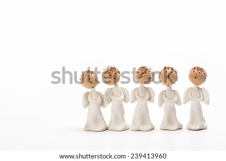 Group of Christmas carolers angel figurines