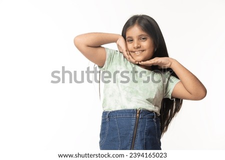 Nice-looking cute lovely attractive cheerful cheery straight-haired blonde girl Full length body size photo of small girl smiling happily keeping long hair isolated on white color background