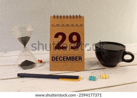 December 29 text on wooden blocks with blurred nature background. Copy space and calendar concept.
