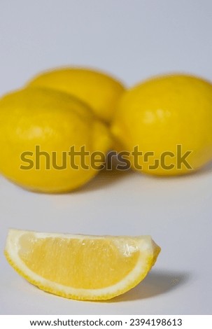 Lemons with a Lemon Wedge