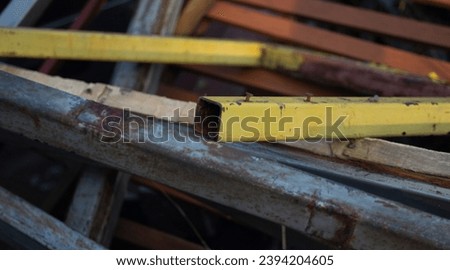 Close up of old rusty metal pipes in construction site, stock photo