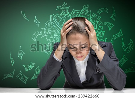 Young troubled businesswoman with hands on head Royalty-Free Stock Photo #239422660