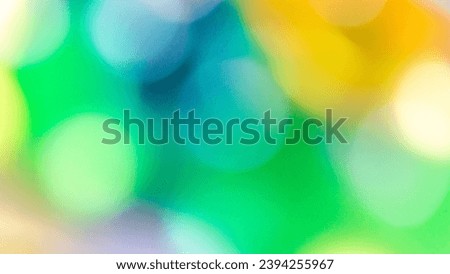 Radiant circles of vibrant light weave a colorful dance in this abstract and lively background 
