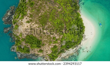 Aerial drone view of greenery lush islandscenery at Lima Island or Pulau Lima in Mersing, Johor, Malaysia