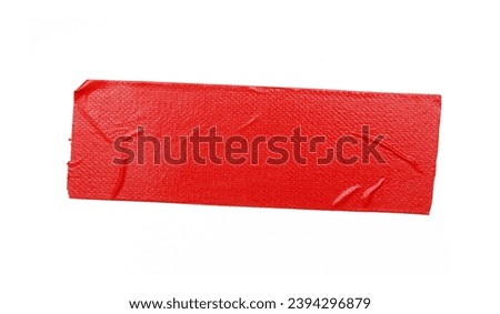 A piece of general purpose vinyl red tape isolated on white  Royalty-Free Stock Photo #2394296879