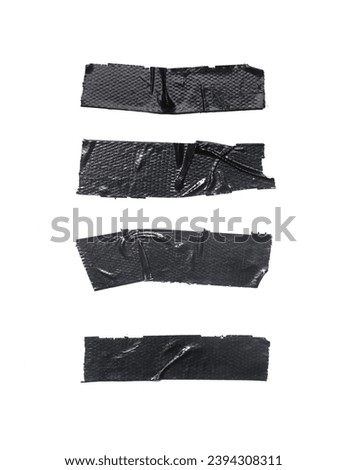 Set of pieces of general purpose vinyl black tape isolated o on white  Royalty-Free Stock Photo #2394308311