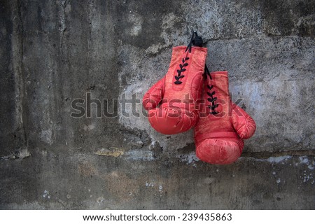 red vintage boxing glove Royalty-Free Stock Photo #239435863