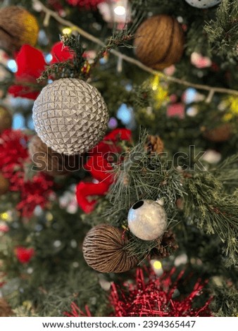 Close up very beautiful decorated christmas trees. Garlands in the background. New Year concept.