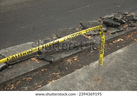 Yellow caution tape on road. Construction work