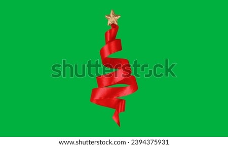 Christmas tree made of ribbon on green screen 
