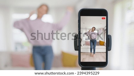 Asia vlogger woman influencer smile enjoy hobby happy fun live online screen  reel  at home Gen Z teen girl talent people play video selfie camera shoot  app show share viral story Royalty-Free Stock Photo #2394395229