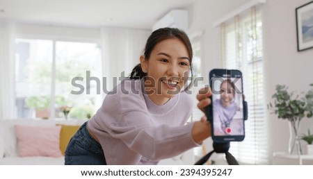 Asia vlogger woman influencer smile enjoy hobby happy fun live online screen  reel  at home Gen Z teen girl talent people play video selfie camera shoot  app show share viral story