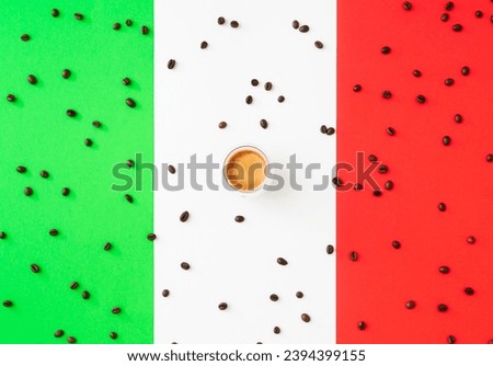 Creative layout made of cup of coffee and coffee beans on flag of Italy as a background. Minimal coffee concept. Trendy espresso idea. Unique flat lay composition. Coffee aesthetic.